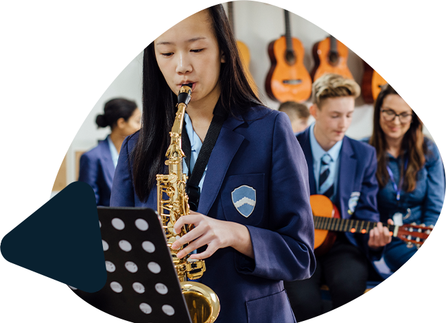 Girls playing saxophone
